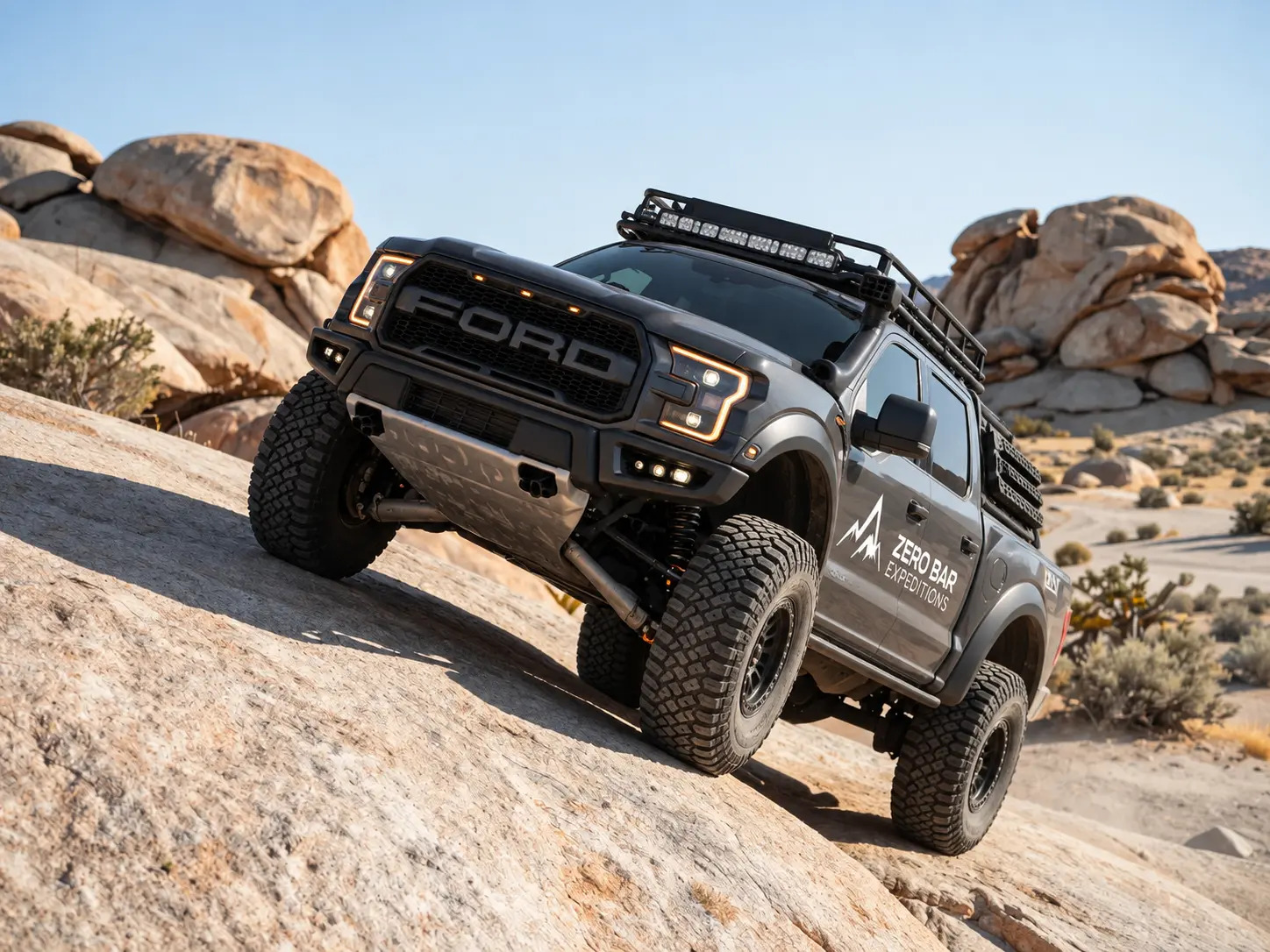 4x4 vehicle navigating granite terrain at Moon Rocks in Nevada